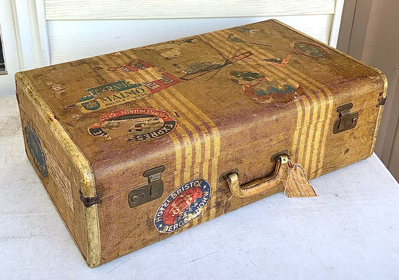 Vintage Suitcase with Travel Stickers