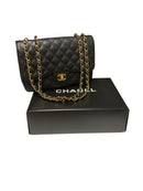 CHANEL Black Quilted Caviar Leather Classic CC Turnlock Flap Bag