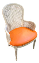 Vintage Cane Chair With Orange Vinyl Seat