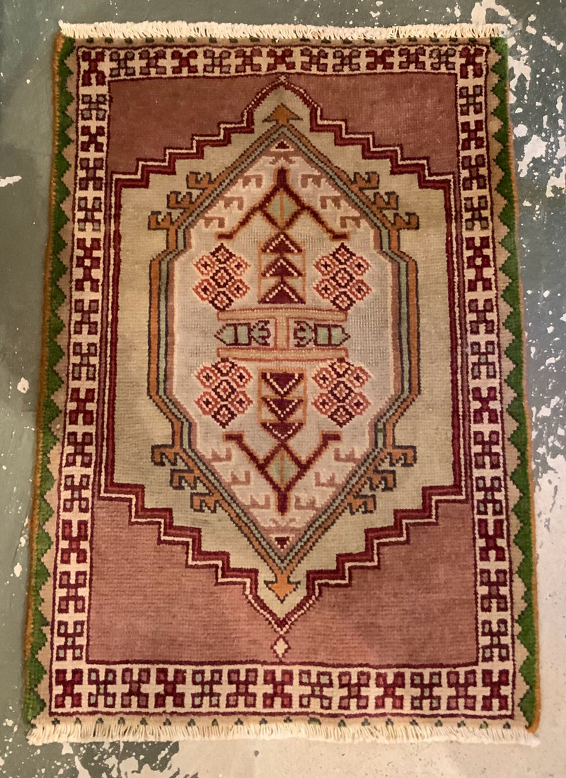 Handmade Wool Rug with Tribal Design
