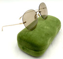 GUCCI Italy Frameless Beige Lens Round Sunglasses