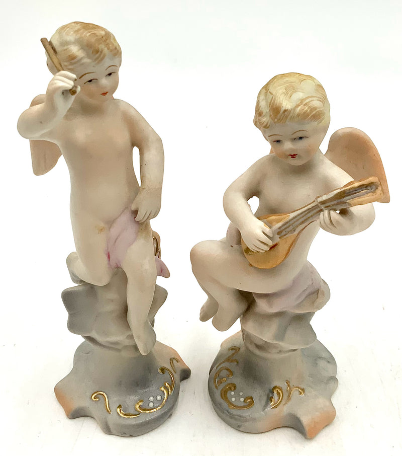 Pair of Occupied Japan Bisque Porcelain Cherub Figures