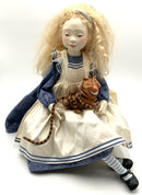 Alice Doll with Chesire Cat by Lucia Friedericy