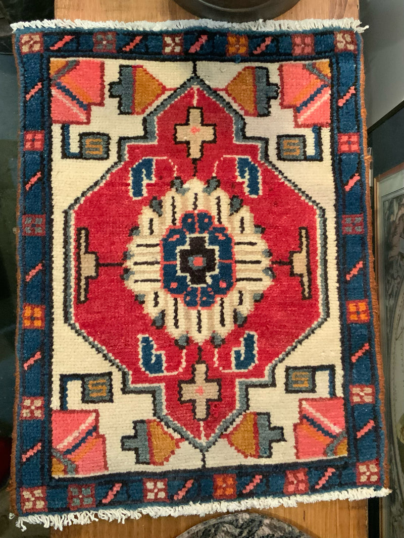 Handmade Mini Wool Rug with Tribal Design