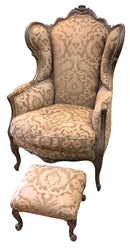 Vintage Carved Wood Wing Chair And Footstool with Brown Flocked Upholstery