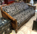 Black & White Upholstered Sofa with Carved Wood Frame