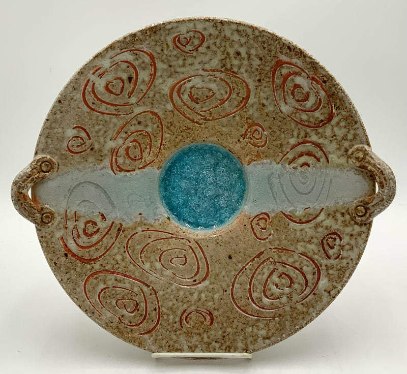 Copper Swirl Pottery Plate with Blue Crackle Bottom